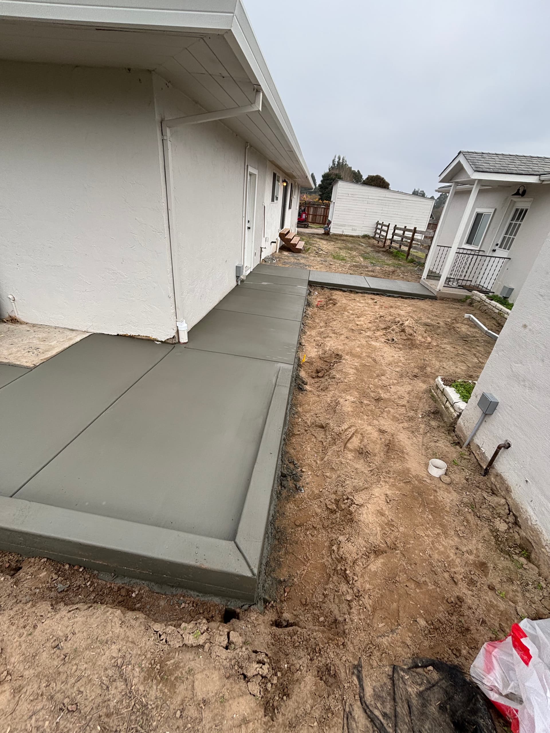 New Driveway and Walkways Installation at Residential Home