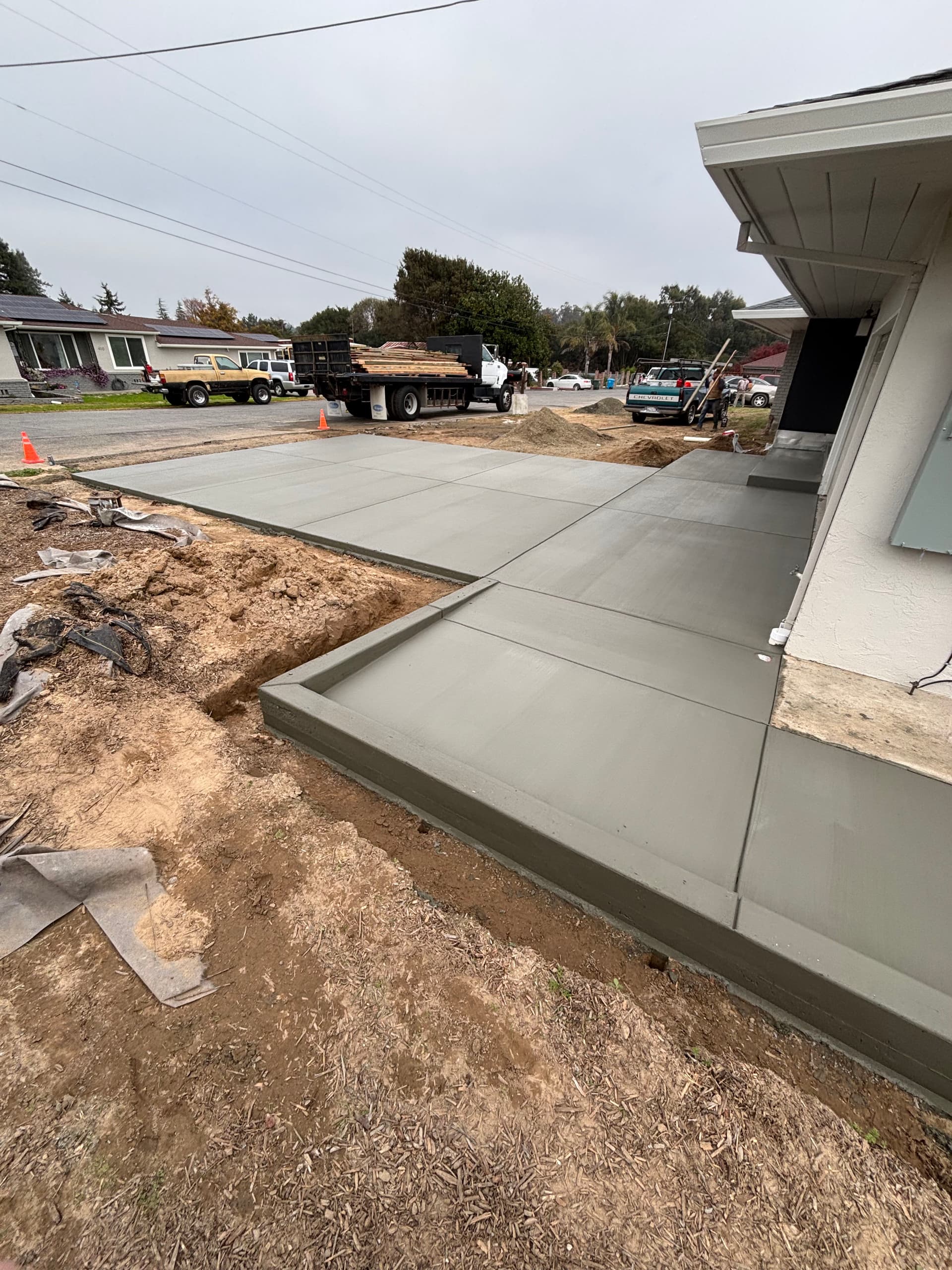 New Driveway and Walkways Installation at Residential Home